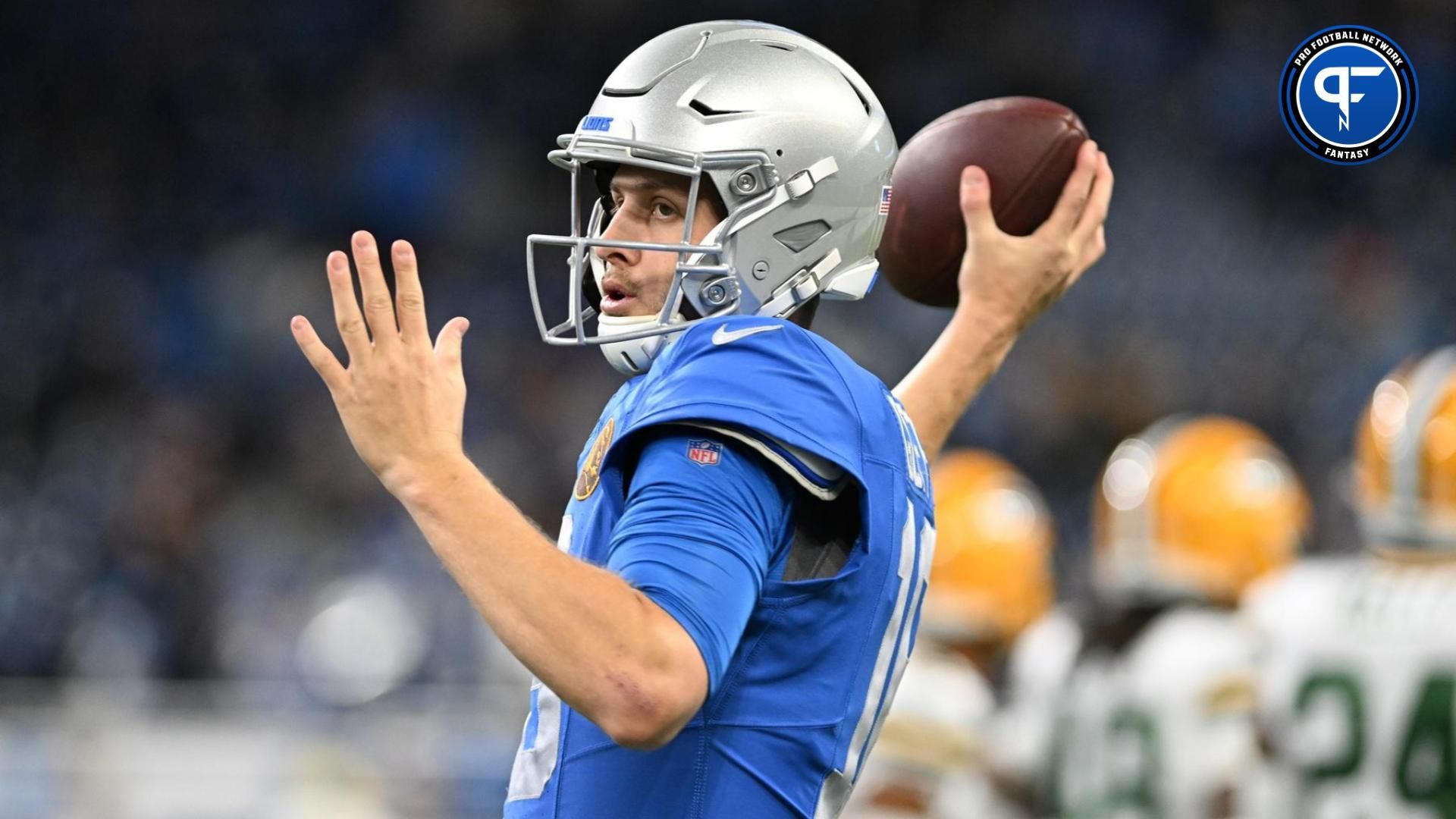 Jared Goff (16) throws passes during pregame warmups before their game against the Green Bay Packers at Ford Field.