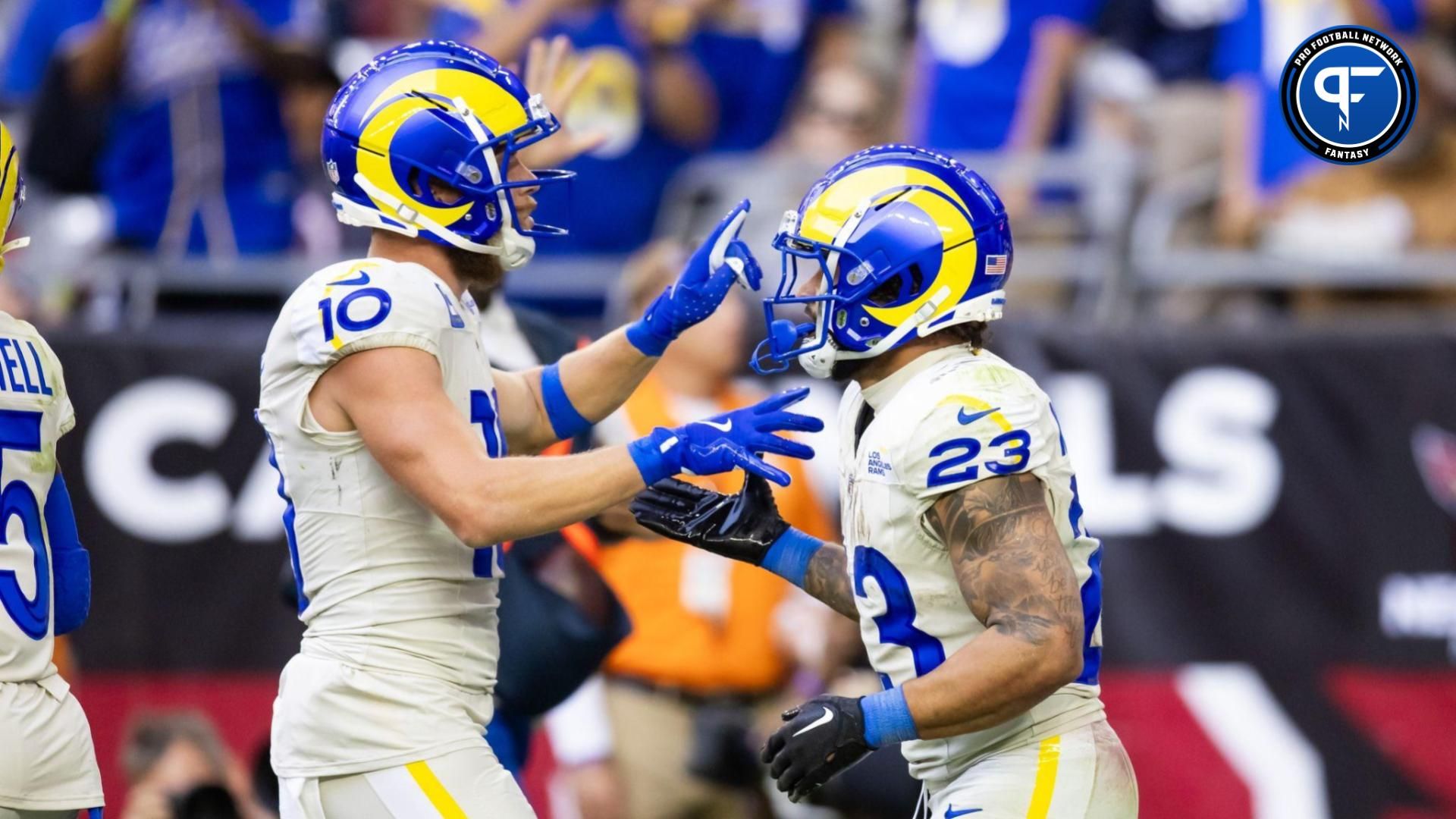 Kyren Williams (23) celebrates a touchdown with wide receiver Cooper Kupp (10) against the Arizona Cardinals in the first half at State Farm Stadium.