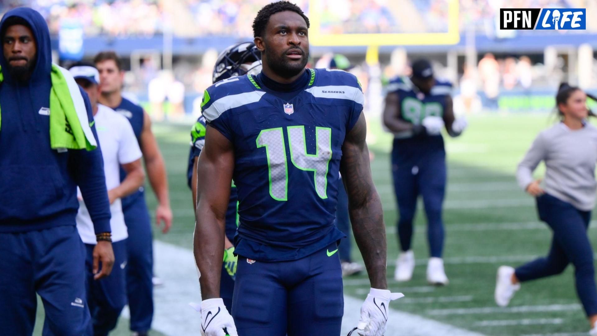 Seattle Seahawks WR DK Metcalf (14) walks off the field.