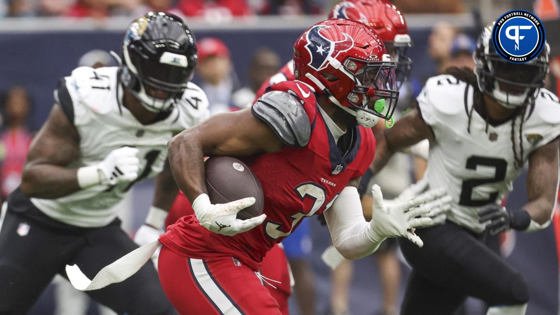 Dameon Pierce (31) runs with the ball during the second quarter against the Jacksonville Jaguars at NRG Stadium.