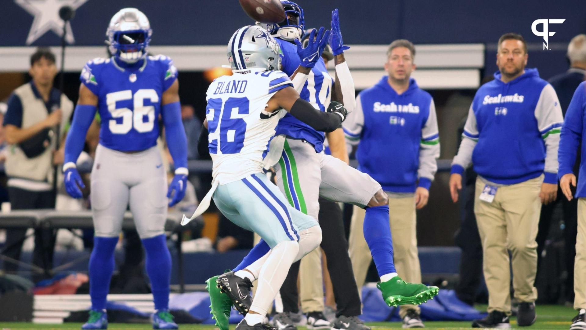 Seattle Seahawks wide receiver DK Metcalf (14) makes a catch while defended by Dallas Cowboys cornerback DaRon Bland (26) during the first half at AT&T Stadium.