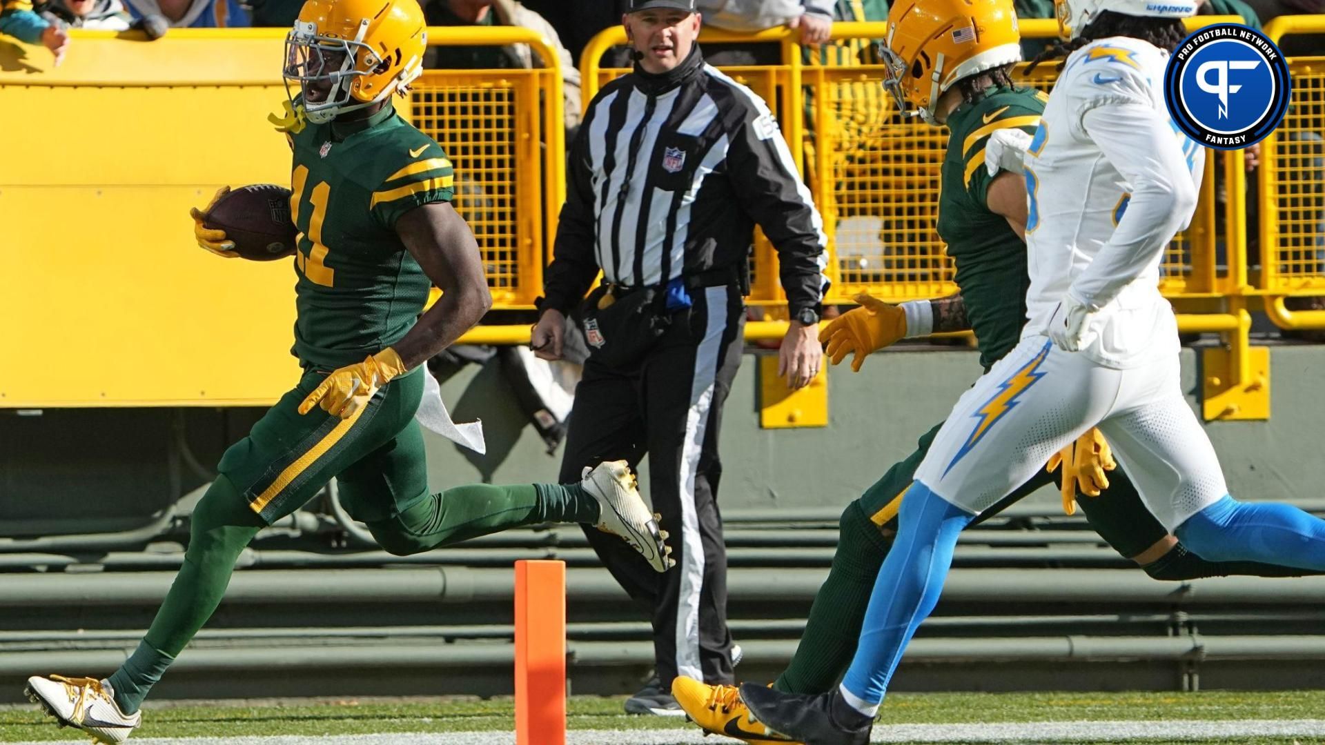 Green Bay Packers WR Jayden Reed (11) scores a touchdown against the Los Angeles Chargers.