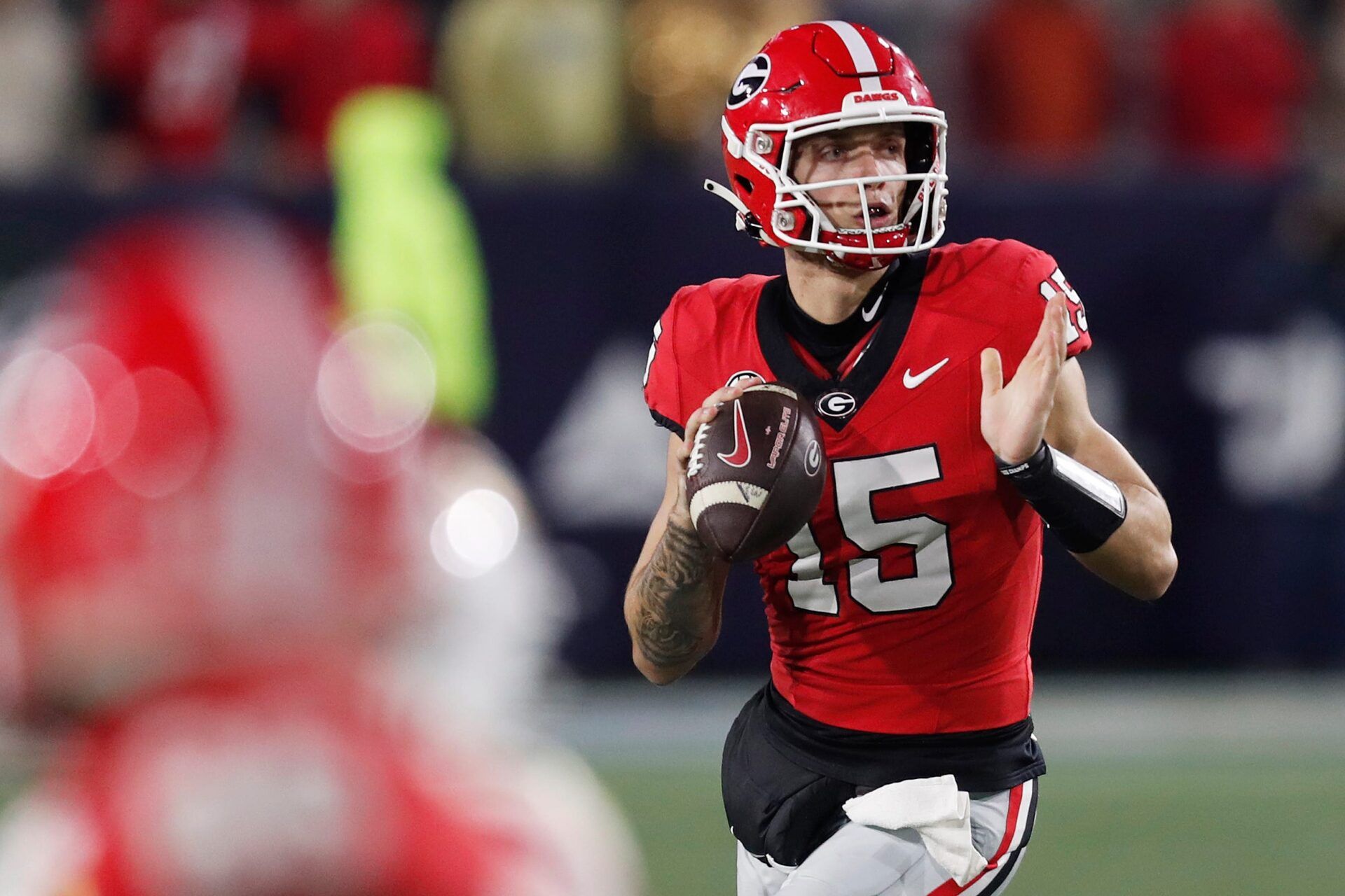 Georgia quarterback Carson Beck (15) looks to throw a pass during the second half of a NCAA college football game against Georgia Tech
