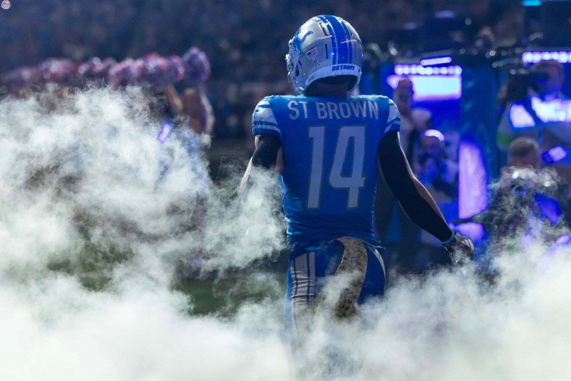 Detroit Lions wide receiver Amon-Ra St. Brown (14) is introduced before the game against the Chicago Bears at Ford Field.