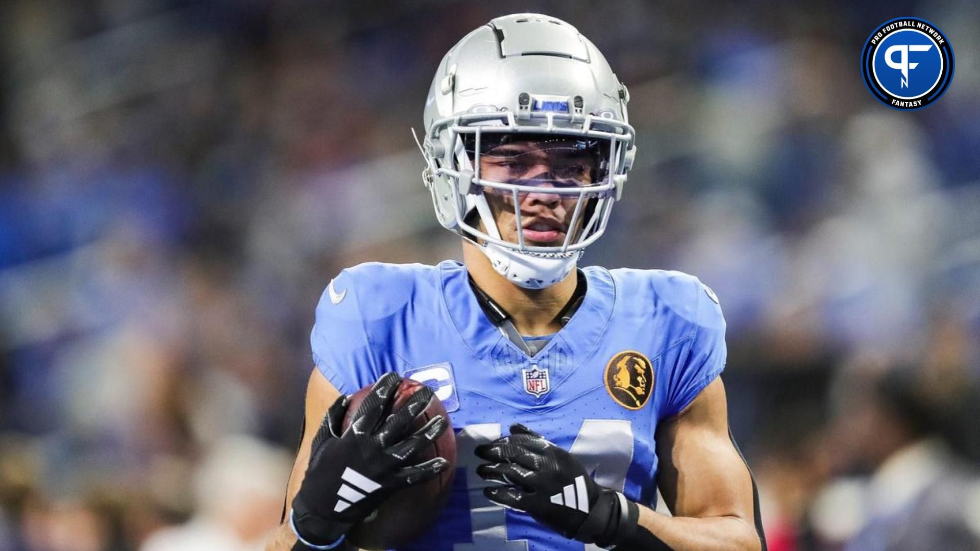 Detroit Lions receiver Amon-Ra St. Brown warms up before the game against the Green Bay Packers at Ford Field.