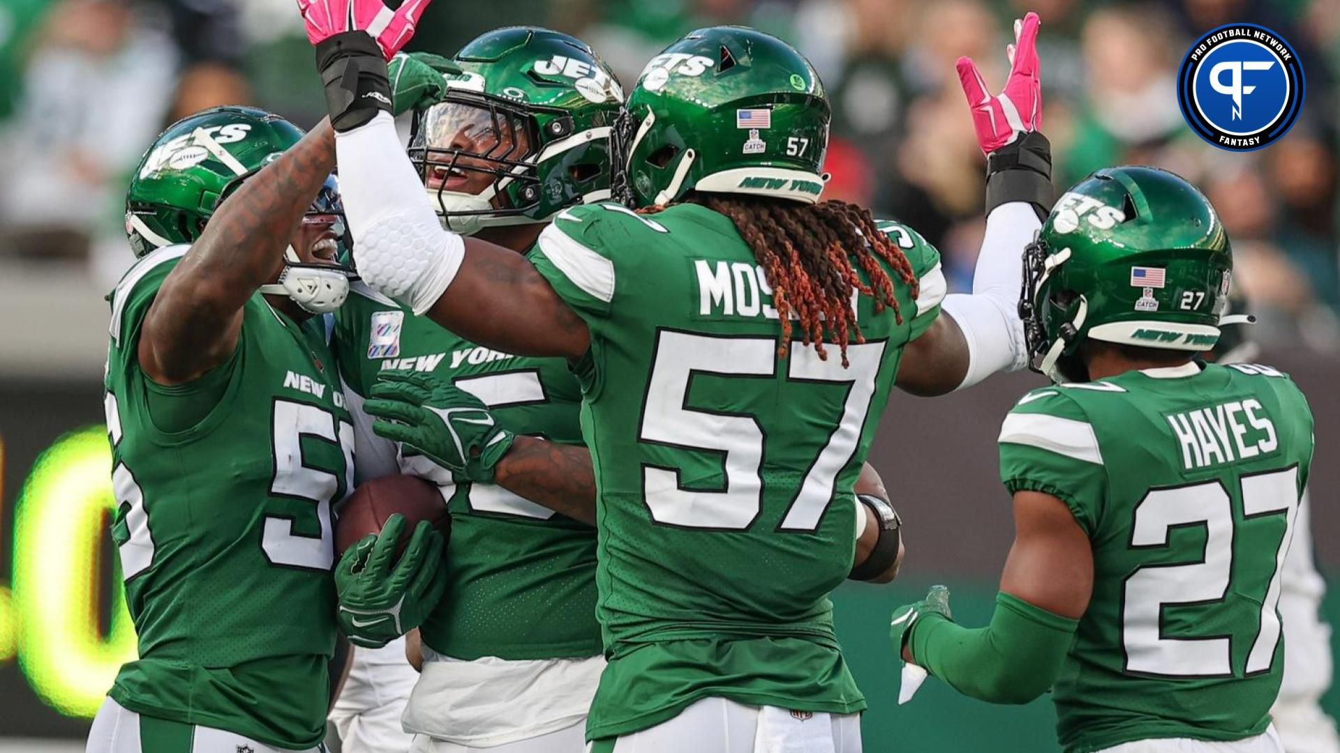 New York Jets defensive tackle Quinnen Williams (95) celebrates with teammates after recovering a fumble during the first half against the Philadelphia Eagles at MetLife Stadium.