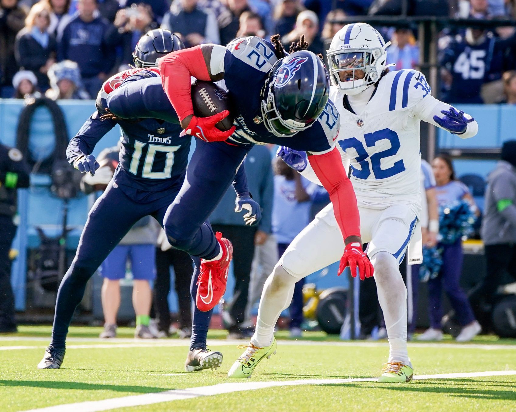 Derrick Henry (22) leaps for a touchdown against the Indianapolis Colts during the second quarter at Nissan Stadium.