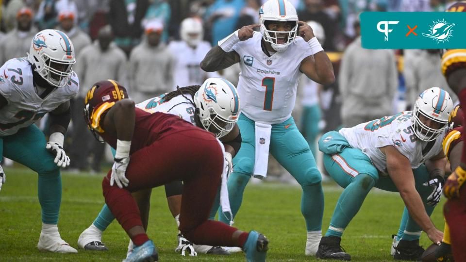 Miami Dolphins quarterback Tua Tagovailoa (1) at the line of scrimmage against the Washington Commanders during the first half at FedExField.