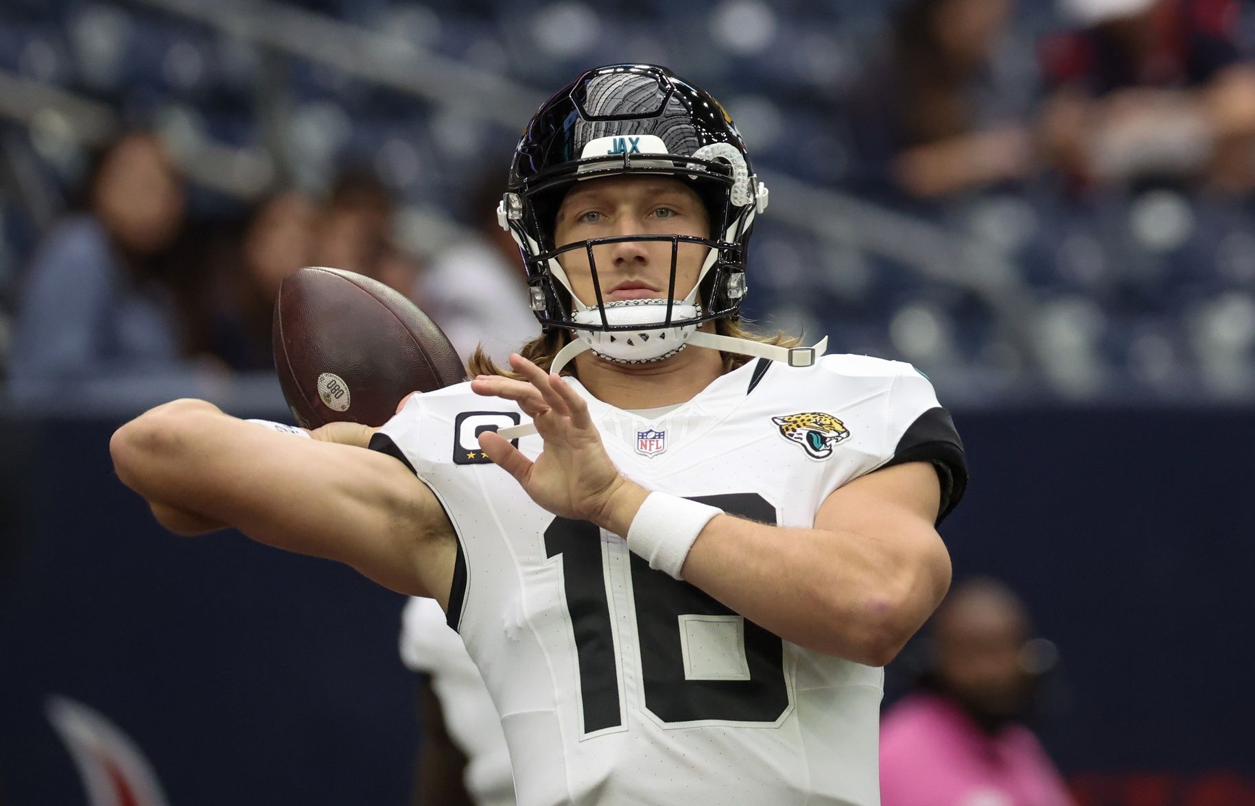 Jacksonville Jaguars quarterback Trevor Lawrence (16) warms up before playing against the Houston Texans at NRG Stadium.