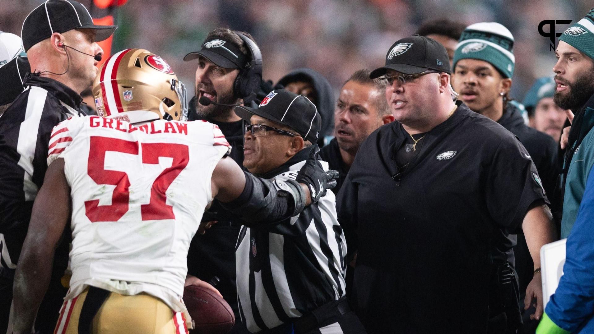 San Francisco 49ers linebacker Dre Greenlaw (57) has an altercation with Philadelphia Eagles staff member Dom DiSandro during the third quarter at Lincoln Financial Field.