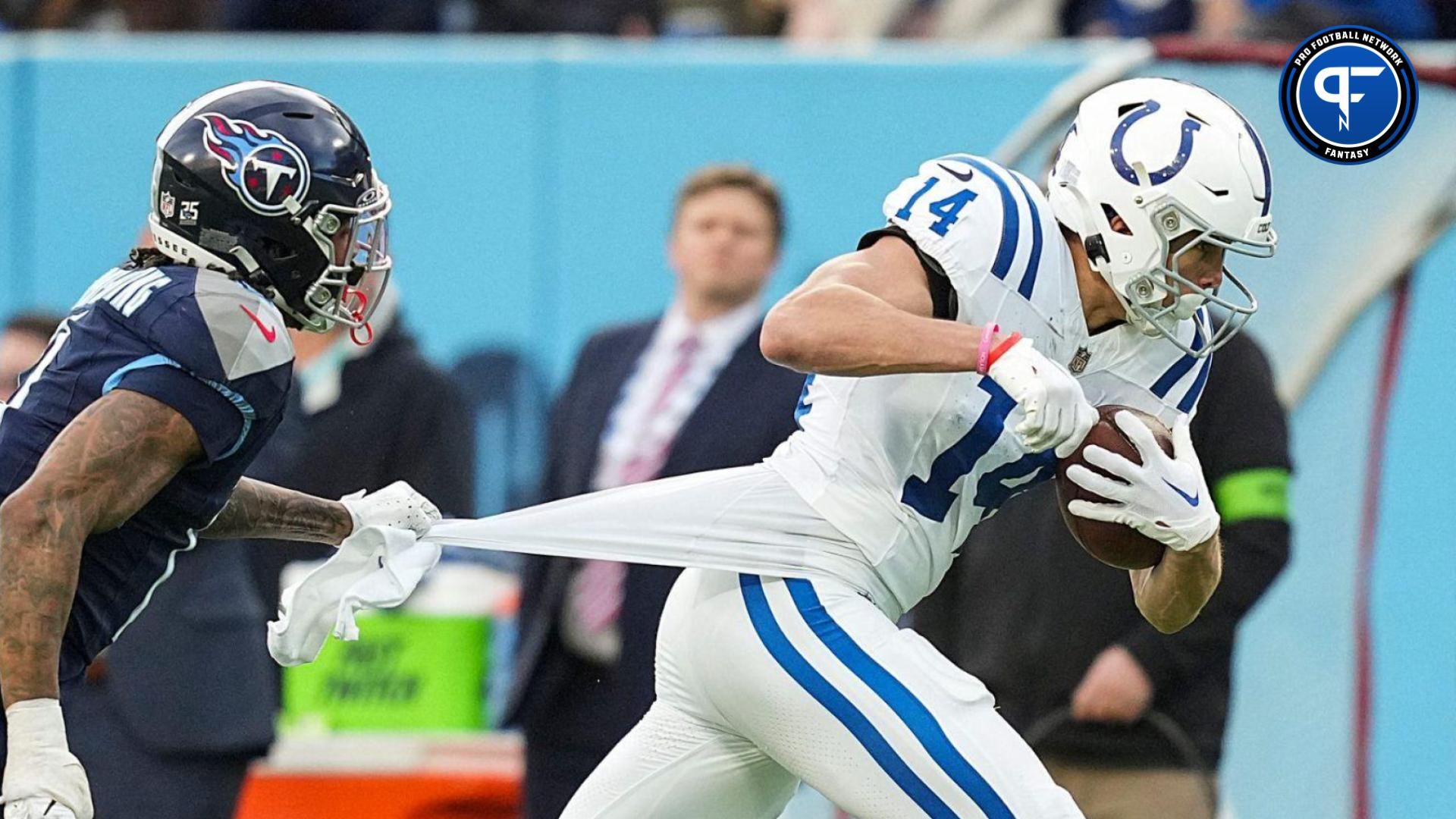 Indianapolis Colts wide receiver Alec Pierce (14) receives a long pass to put the Colts at first and goal in overtime Sunday, Dec. 3, 2023, at Nissan Stadium in Nashville, Tenn.