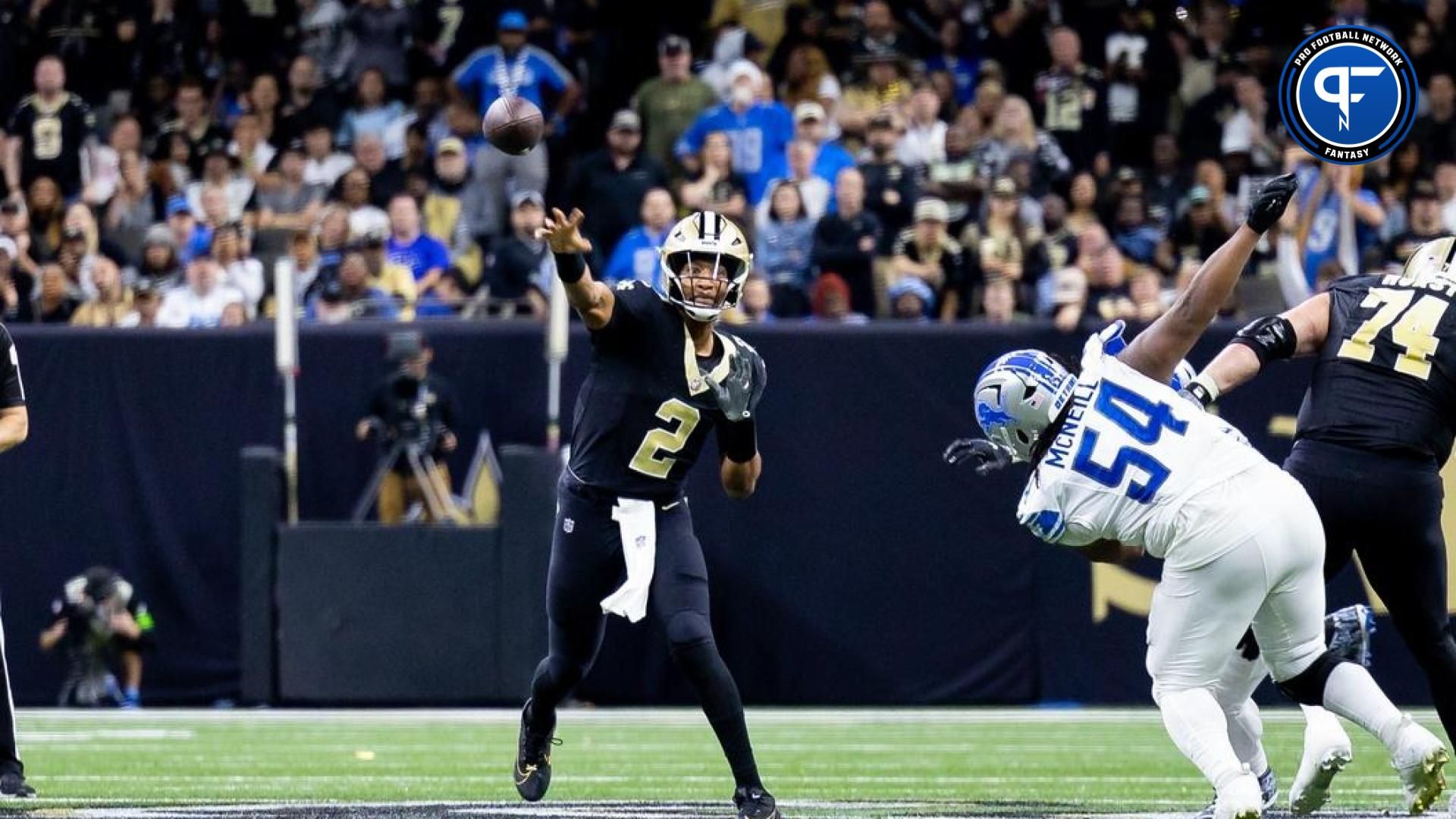 New Orleans Saints quarterback Jameis Winston (2) passes the ball against Detroit Lions defensive tackle Alim McNeill (54) during the second half at the Caesars Superdome.