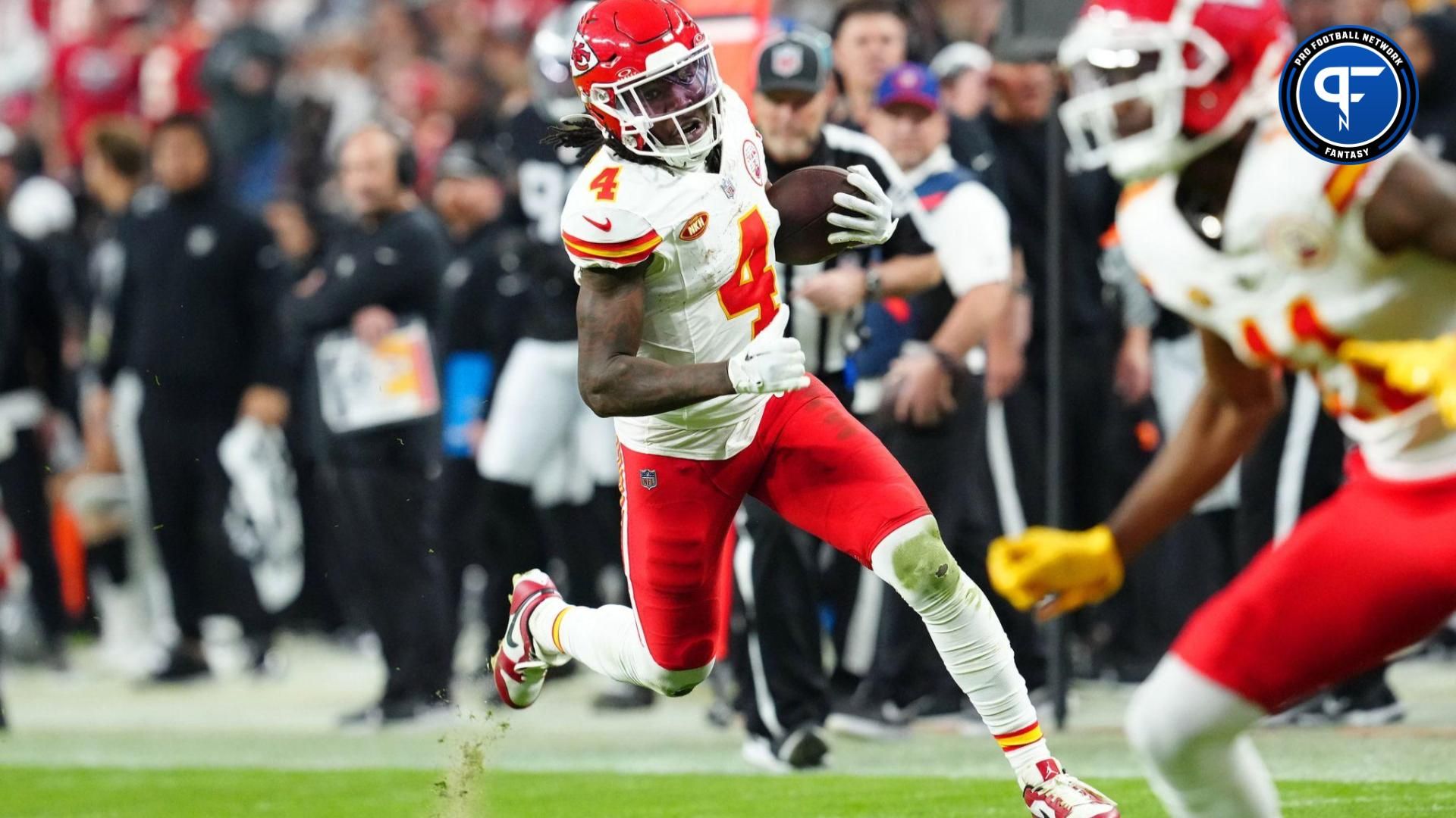 Kansas City Chiefs WR Rashee Rice (4) runs with the ball against the Las Vegas Raiders.