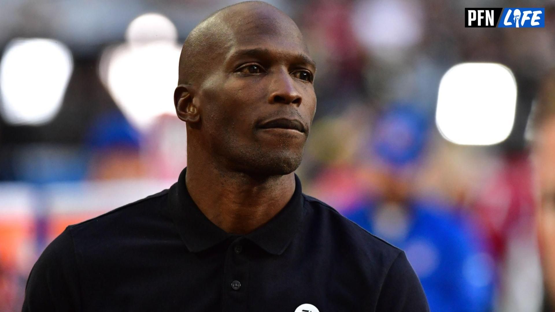 Former NFL player Chad Ochocinco Johnson looks on prior to the game between the Arizona Cardinals and the New Orleans Saints at State Farm Stadium.