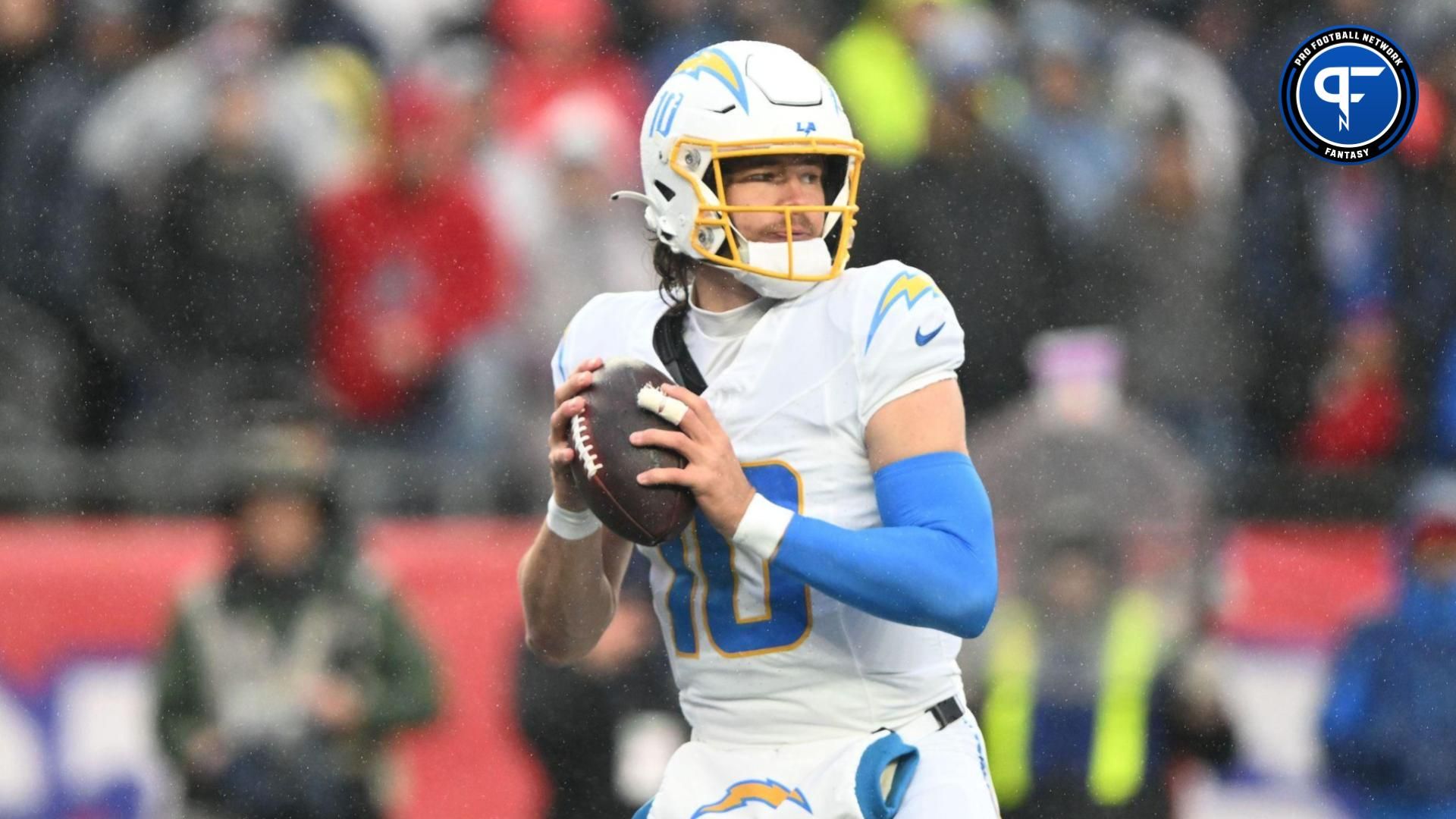 Los Angeles Chargers quarterback Justin Herbert (10) looks to throw against the New England Patriots during the first half at Gillette Stadium.