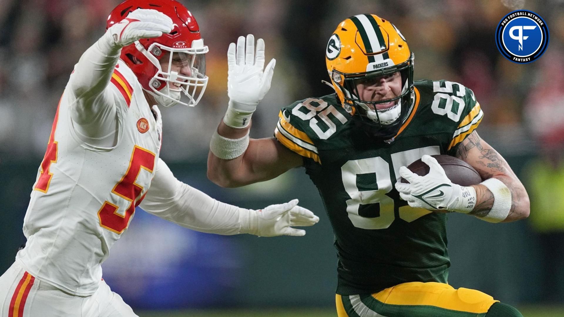 Green Bay Packers tight end Tucker Kraft (85) makes a reception for first down before being tackled by Kansas City Chiefs linebacker Leo Chenal (54) during the first quarter at Lambeau Field.