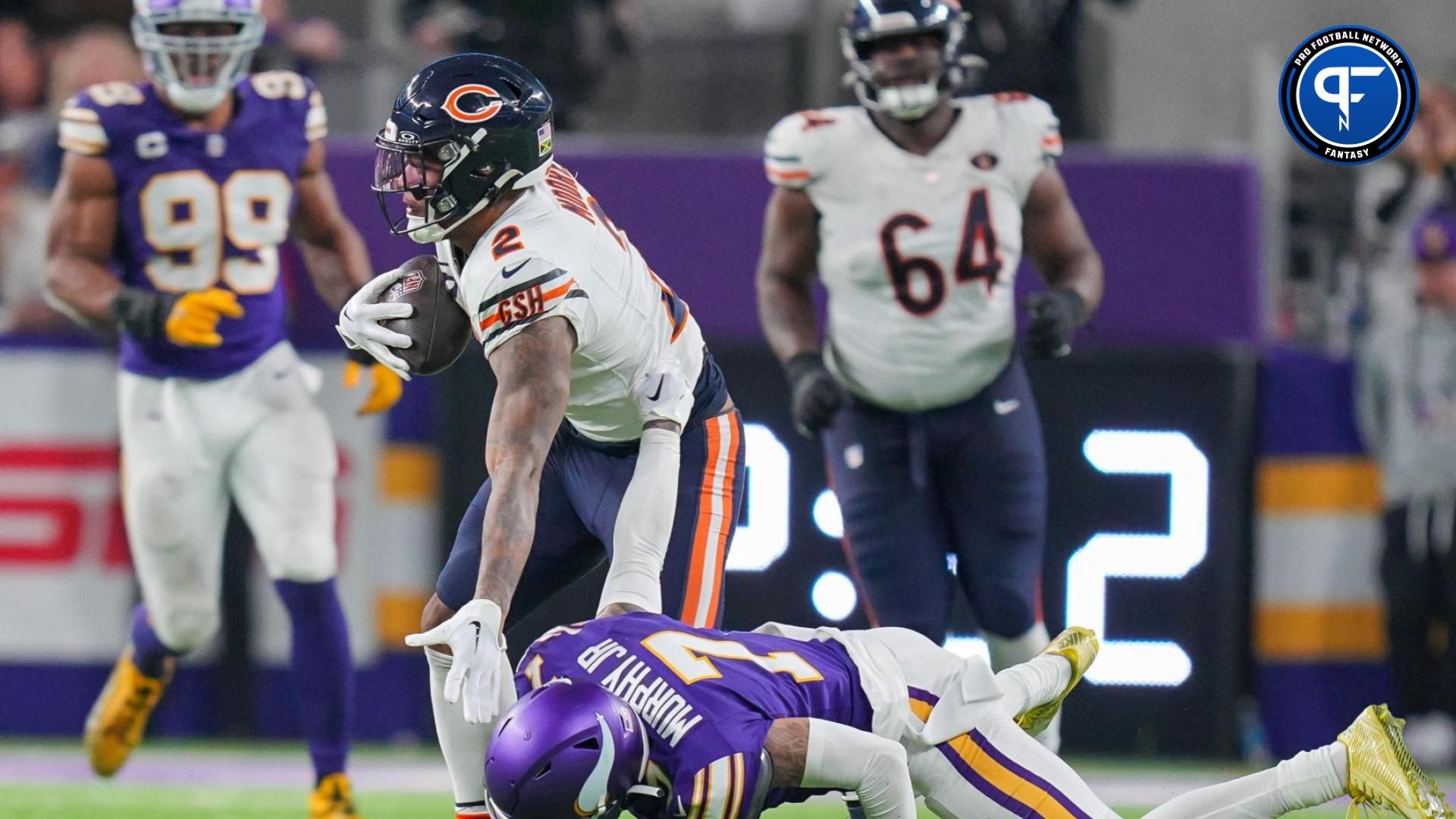 DJ Moore (2) runs after the catch against the Minnesota Vikings cornerback Byron Murphy Jr. (7) in the fourth quarter at U.S. Bank Stadium.