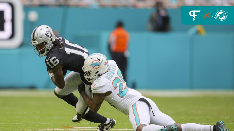 Miami Dolphins CB Xavien Howard (25) tackles Las Vegas Raiders WR Jakobi Meyers (16).