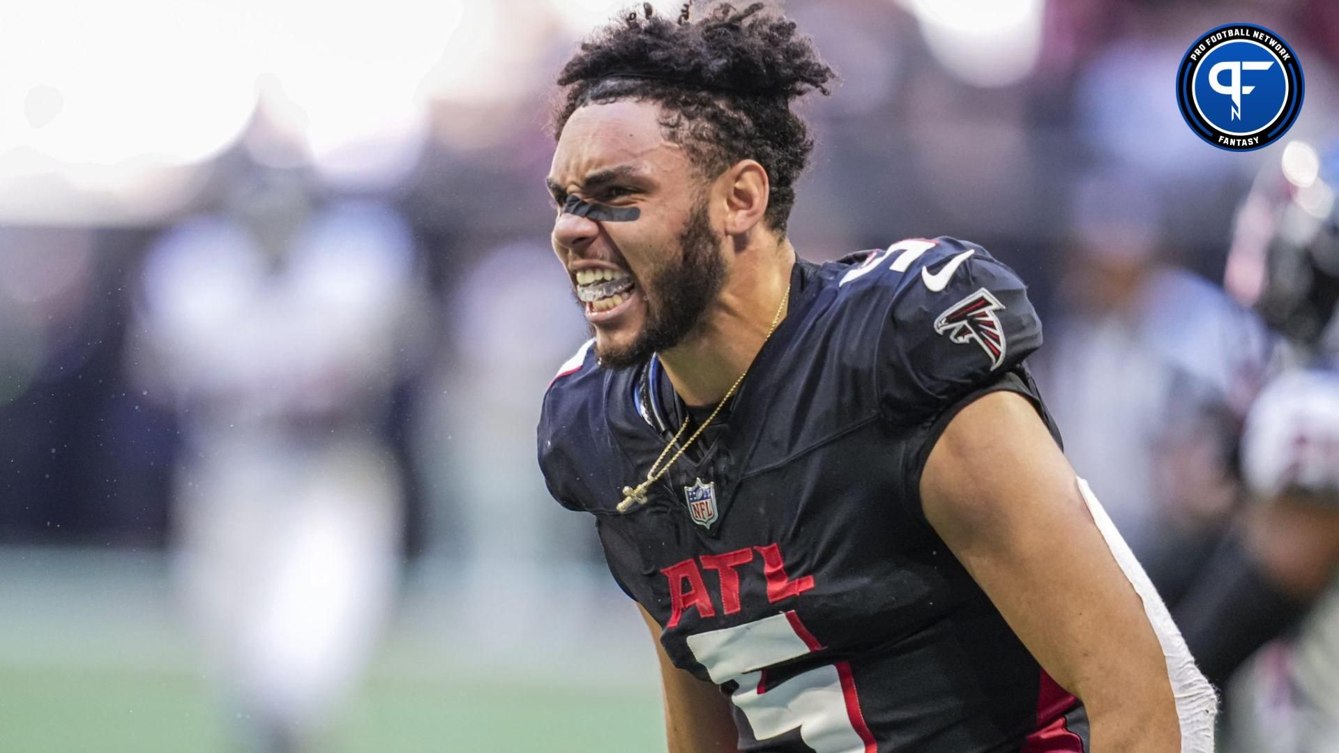 Atlanta Falcons wide receiver Drake London (5) reacts after making a catch and losing his helmet against the Houston Texans during the second half at Mercedes-Benz Stadium.