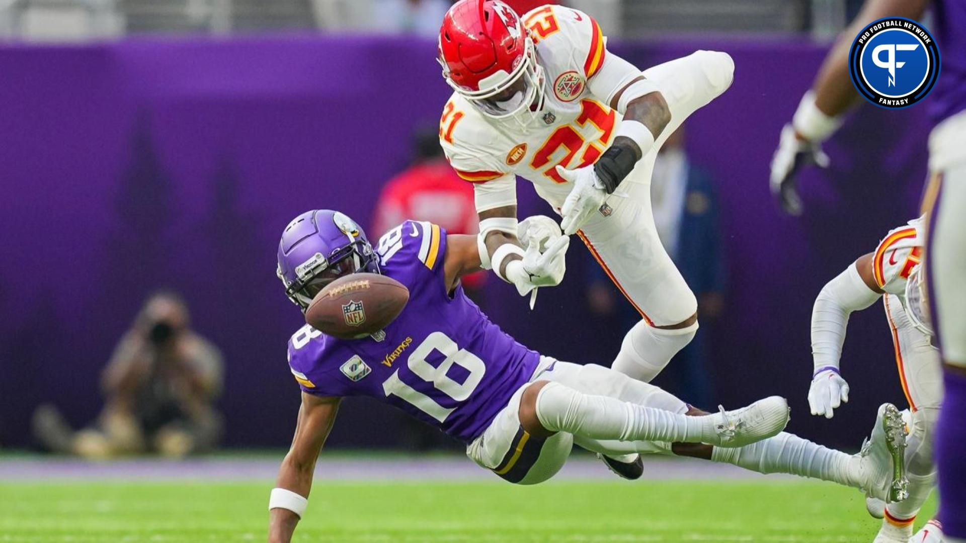 Kansas City Chiefs safety Mike Edwards (21) breaks up a pass to Minnesota Vikings wide receiver Justin Jefferson (18) in the third quarter at U.S. Bank Stadium.