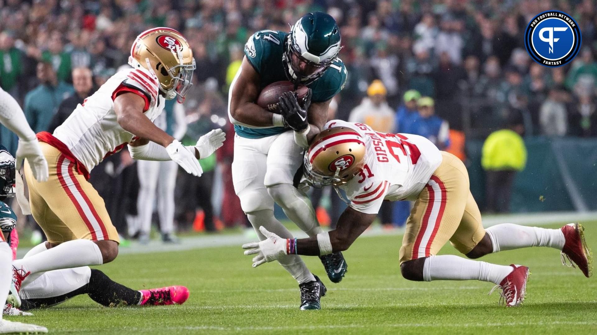 Philadelphia Eagles running back Kenneth Gainwell (14) breaks the tackle attempt of San Francisco 49ers safety Tashaun Gipson Sr. (31) during the first quarter at Lincoln Financial Field.