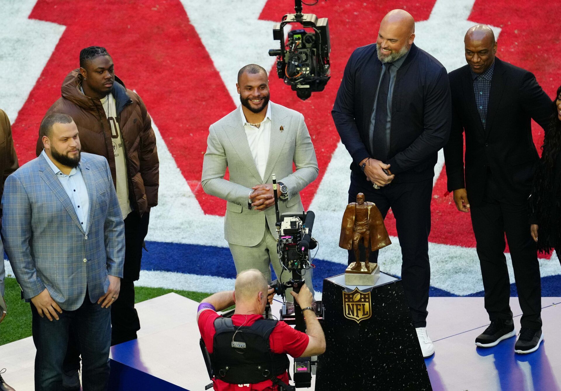 Dak Prescott receives the Walter Payton Man of the Year award during Super Bowl LVII between the Kansas City Chiefs and Philadelphia Eagles at State Farm Stadium in Glendale on Feb. 12, 2023.