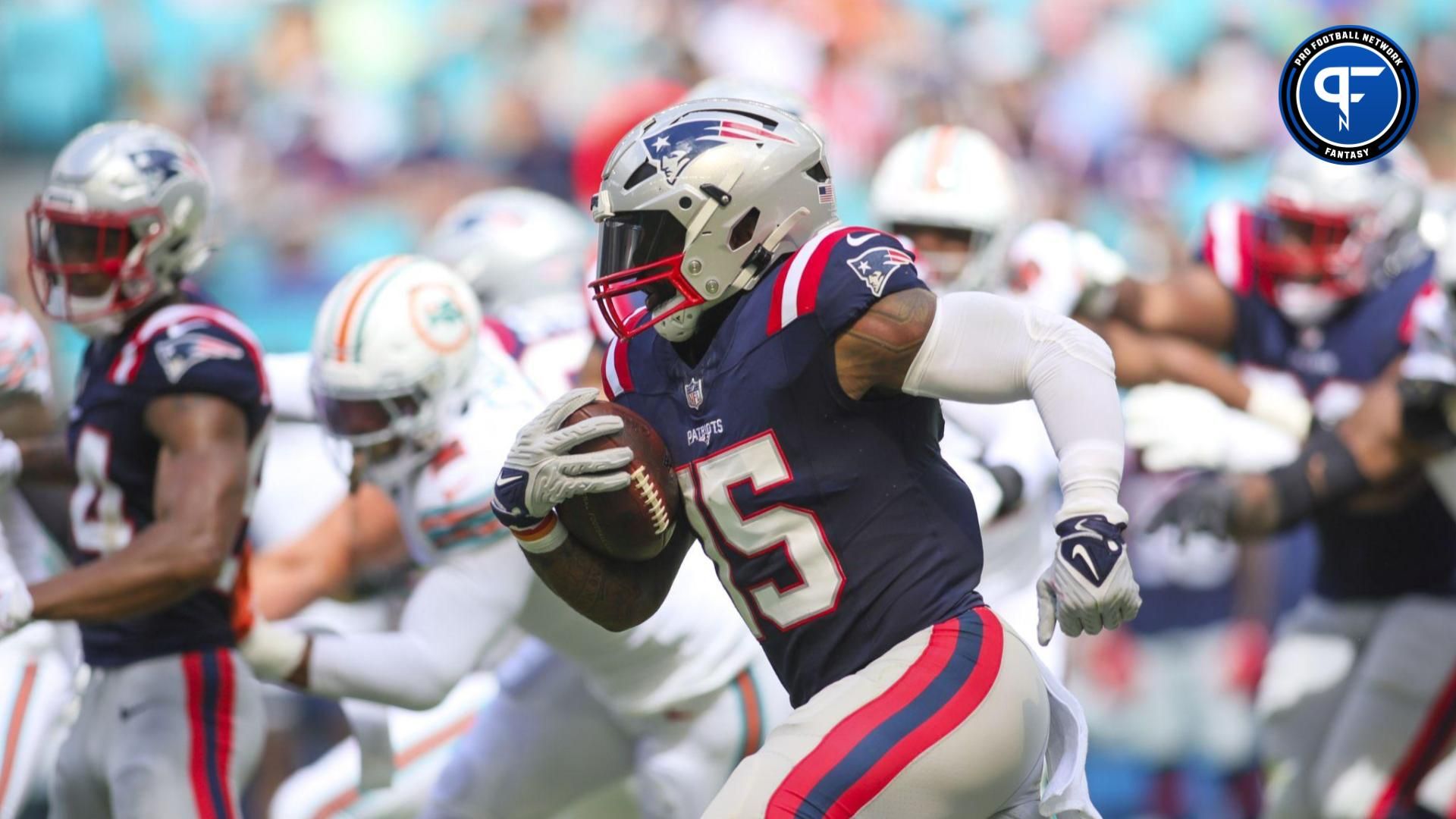 New England Patriots RB Ezekiel Elliott (15) runs the ball against the Miami Dolphins.