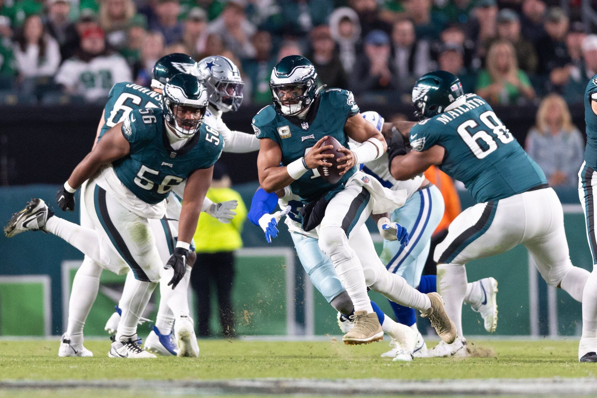 Philadelphia Eagles quarterback Jalen Hurts (1) runs with the ball against the Dallas Cowboys during the second quarter at Lincoln Financial Field.