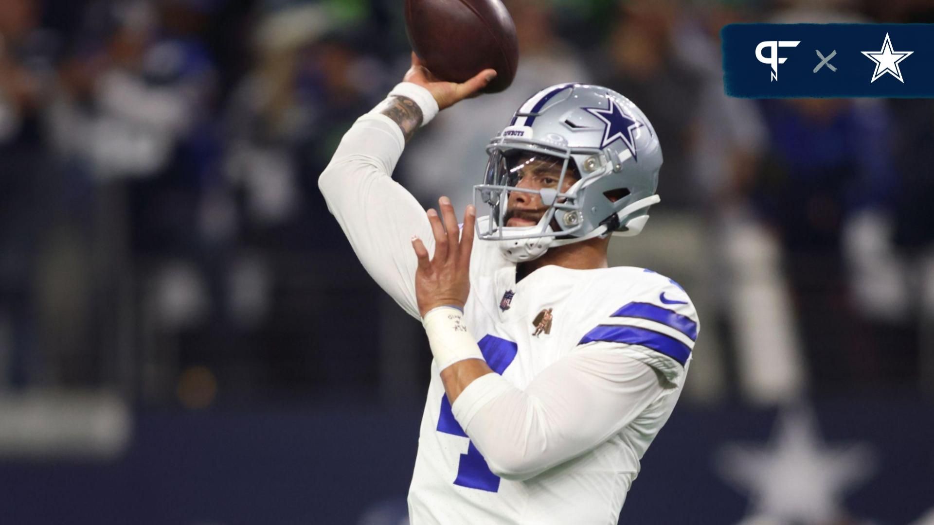 Dallas Cowboys quarterback Dak Prescott (4) warms up before the game against the Seattle Seahawks at AT&T Stadium.