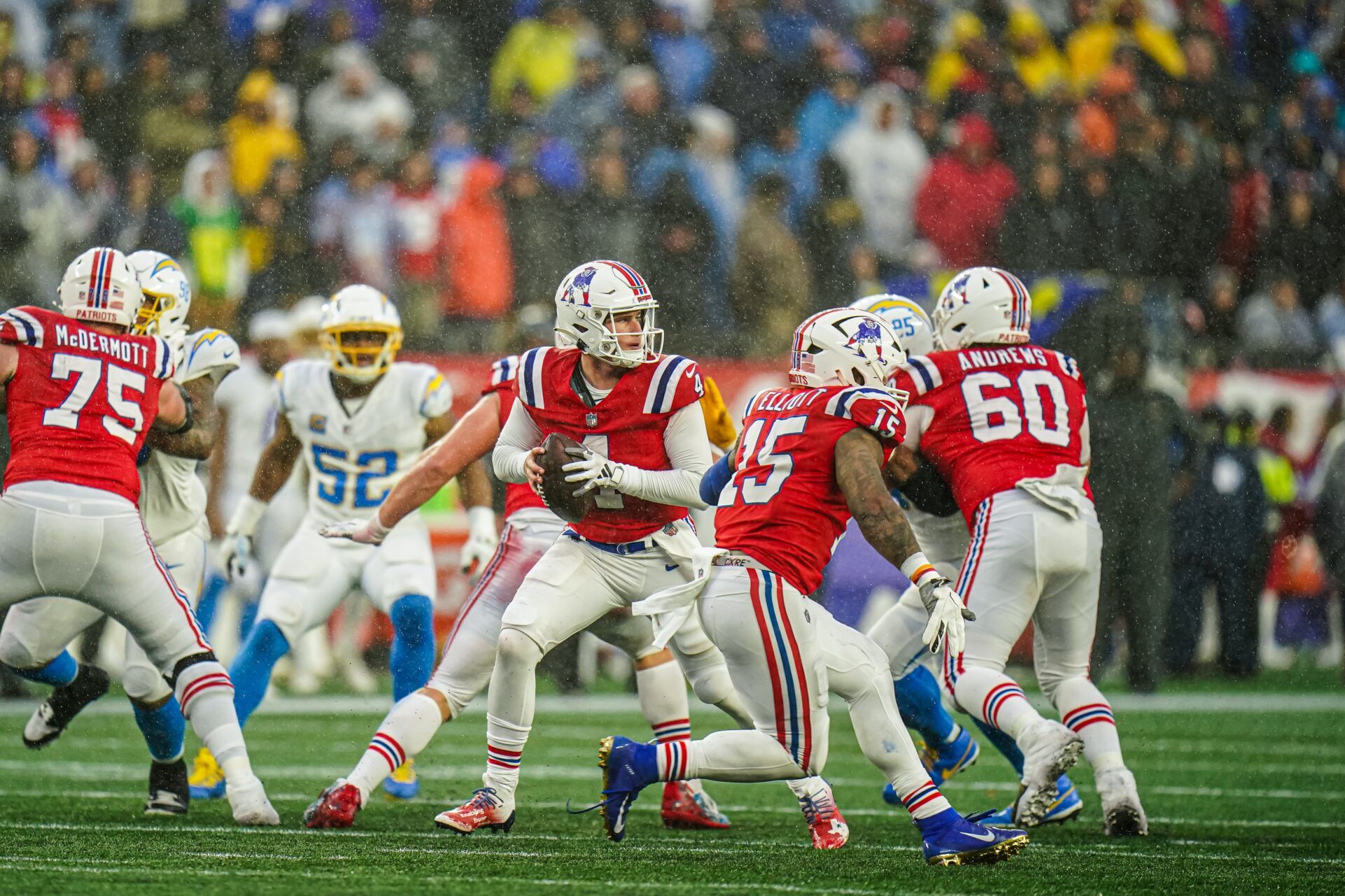 New England Patriots quarterback Bailey Zappe (4) looks to pass against the Los Angeles Chargers in the second half at Gillette Stadium.