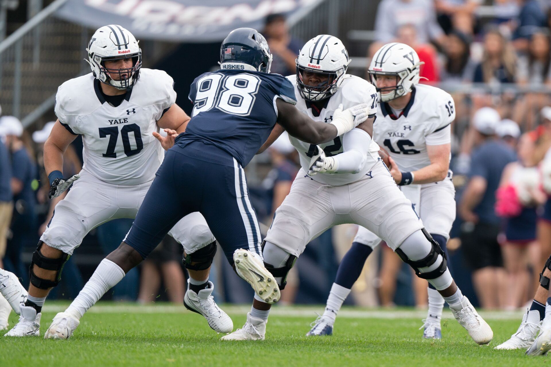 Yale Bulldogs offensive lineman Kiran Amegadjie (72) blocks Connecticut Huskies defensive lineman Lwal Uguak (98) during the first half.