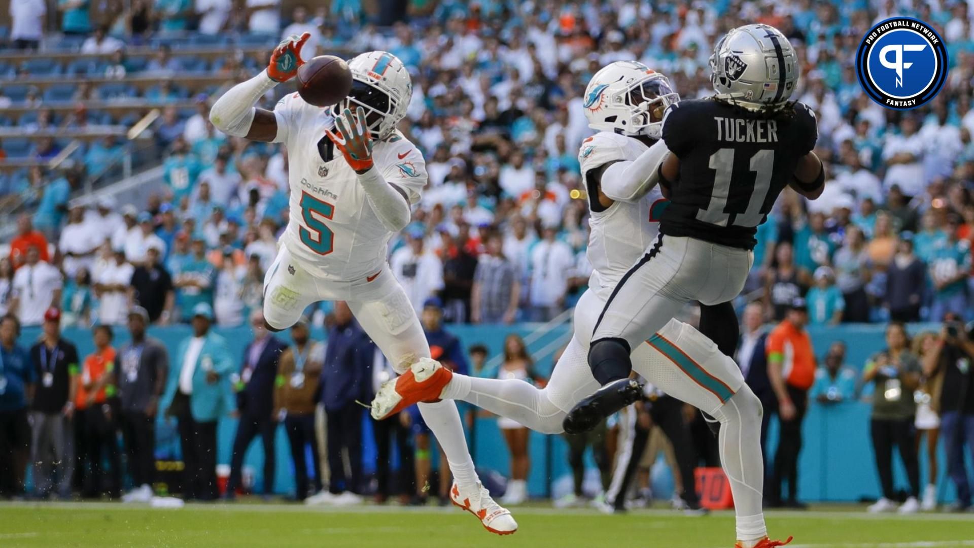 Miami Dolphins cornerback Jalen Ramsey (5) intercepts a pass intended to Las Vegas Raiders wide receiver Tre Tucker (11) during the fourth quarter at Hard Rock Stadium.