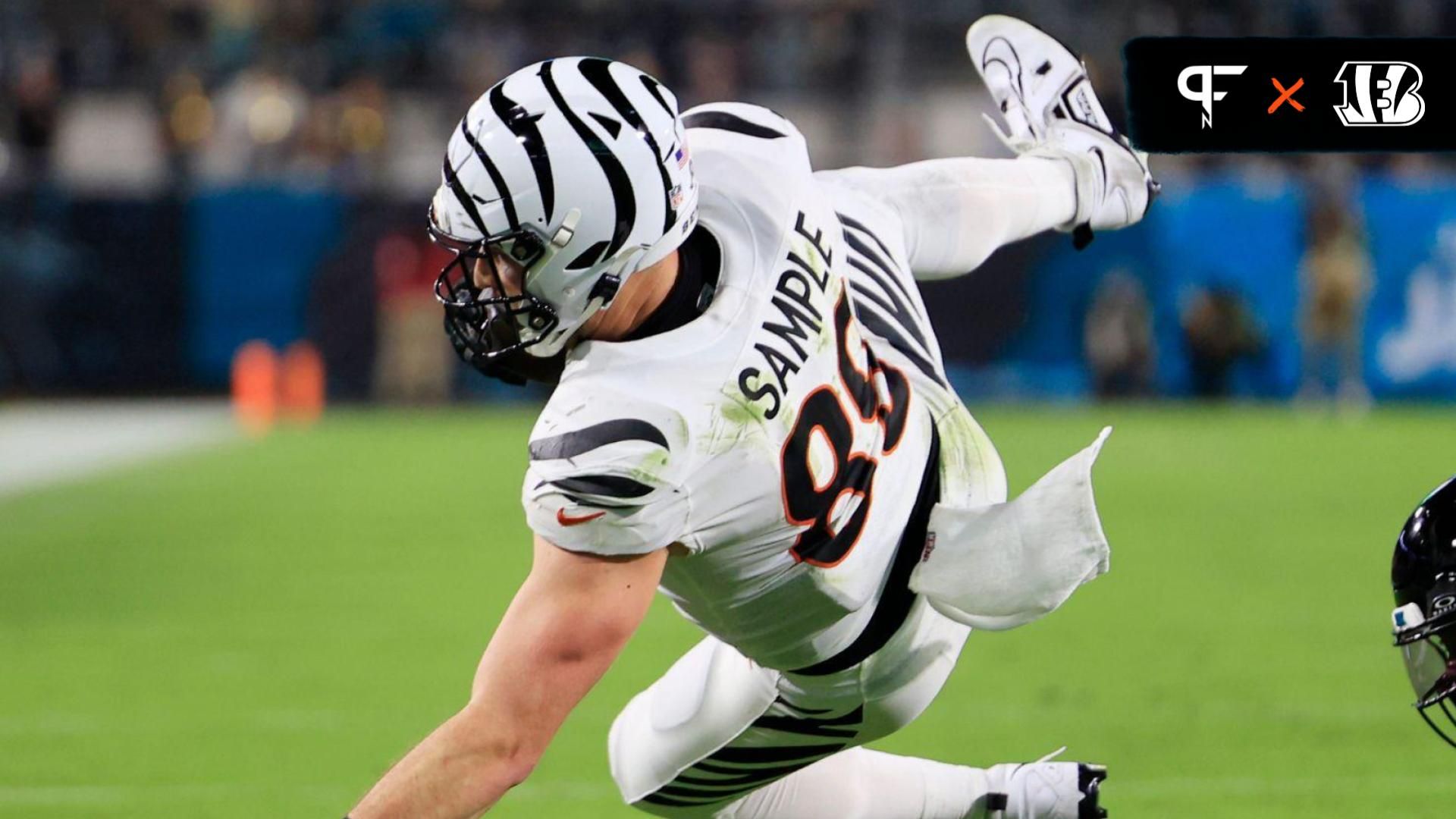 Cincinnati Bengals tight end Drew Sample (89) is tripped up by Jacksonville Jaguars cornerback Darious Williams (31) during the second quarter of a regular season NFL football matchup Monday, Dec. 4, 2023 at EverBank Stadium in Jacksonville, Fla