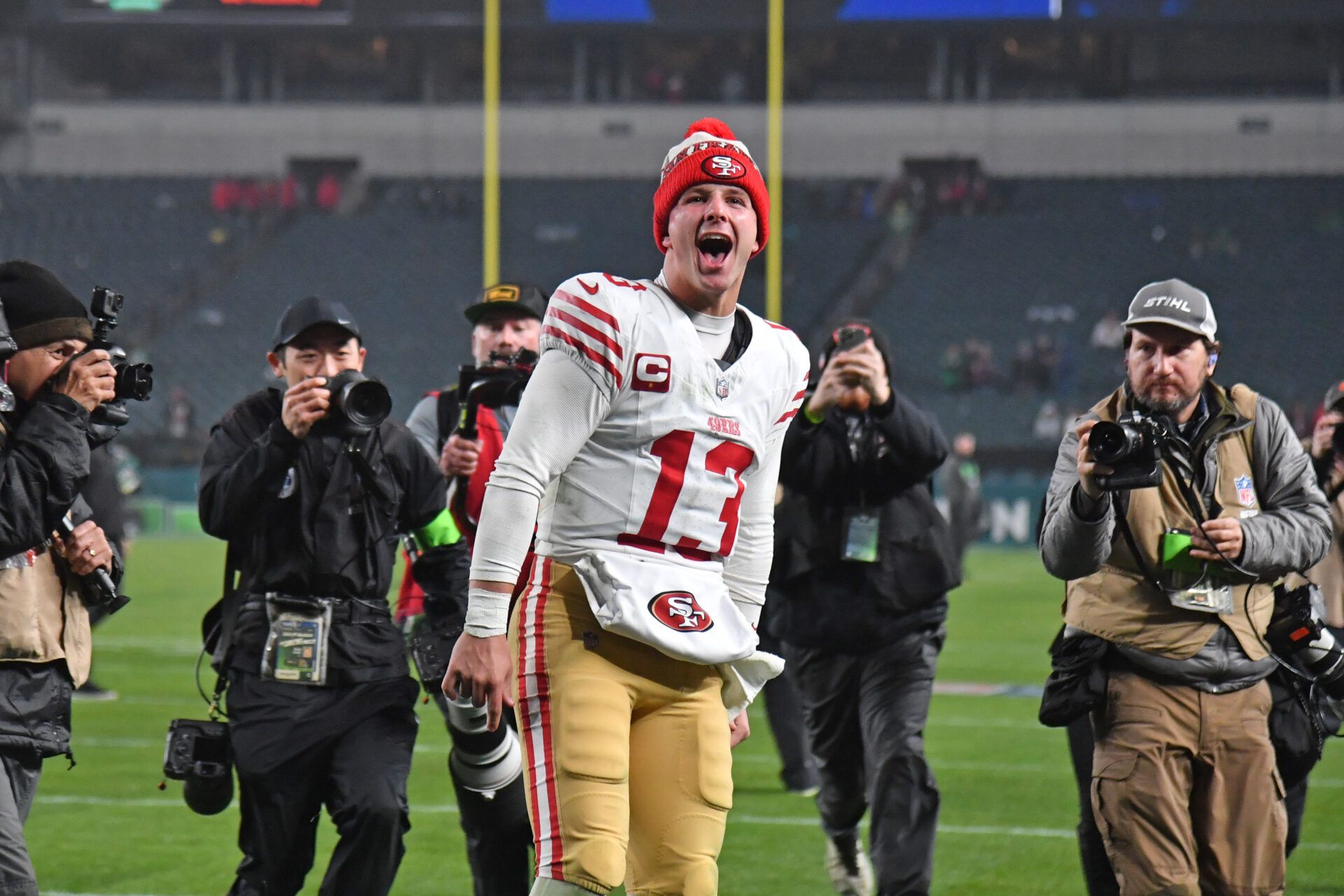 San Francisco 49ers quarterback Brock Purdy (13) walks off the field after win against the Philadelphia Eagles at Lincoln Financial Field.