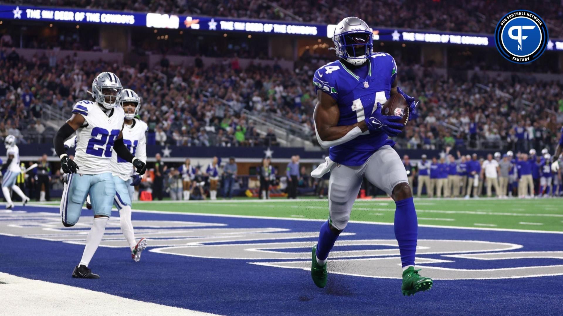 Seattle Seahawks wide receiver DK Metcalf (14) catches a pass for a touchdown during the second half against the Dallas Cowboys at AT&T Stadium.