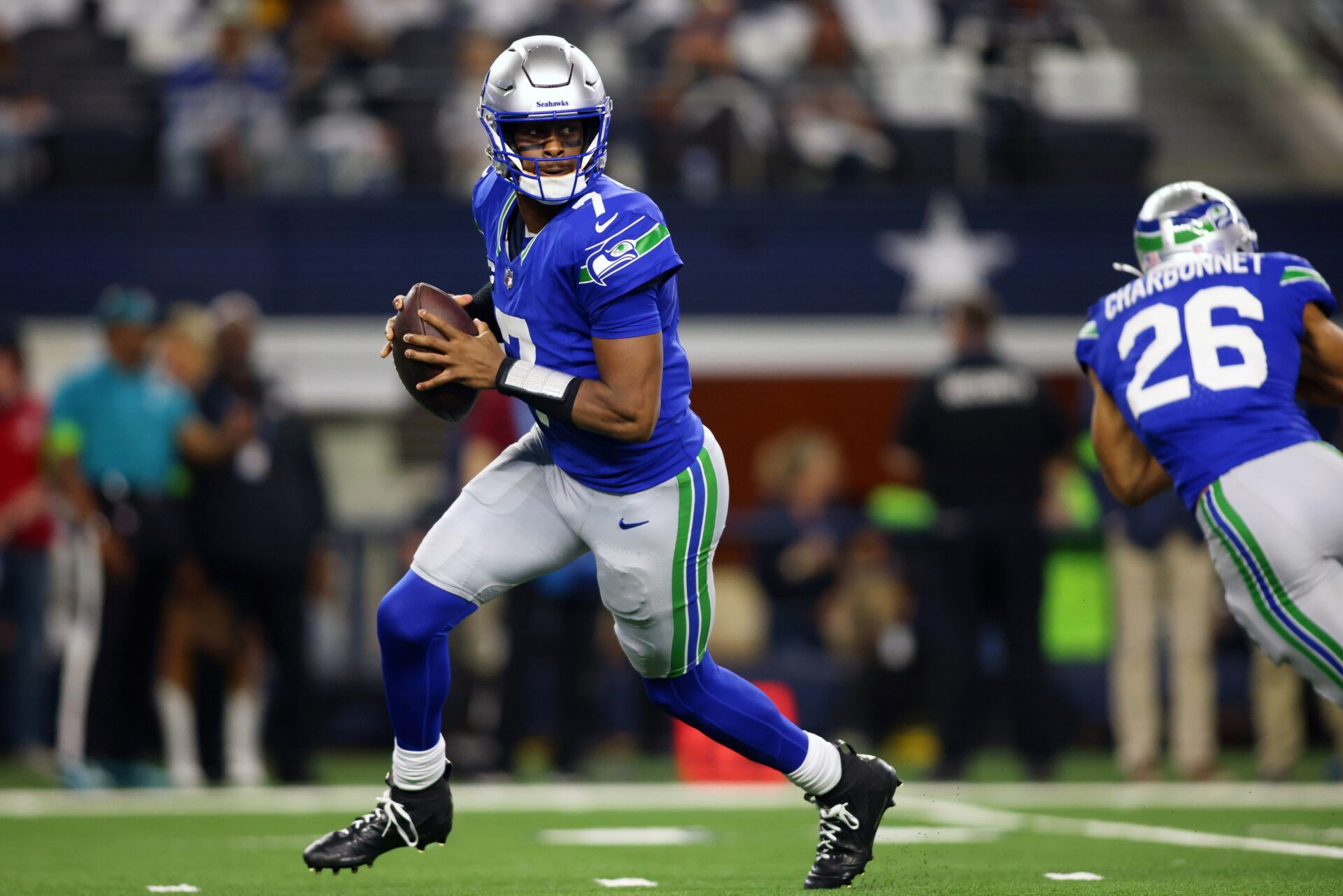 Seattle Seahawks quarterback Geno Smith (7) looks to pass against the Dallas Cowboys during the first half at AT&T Stadium.