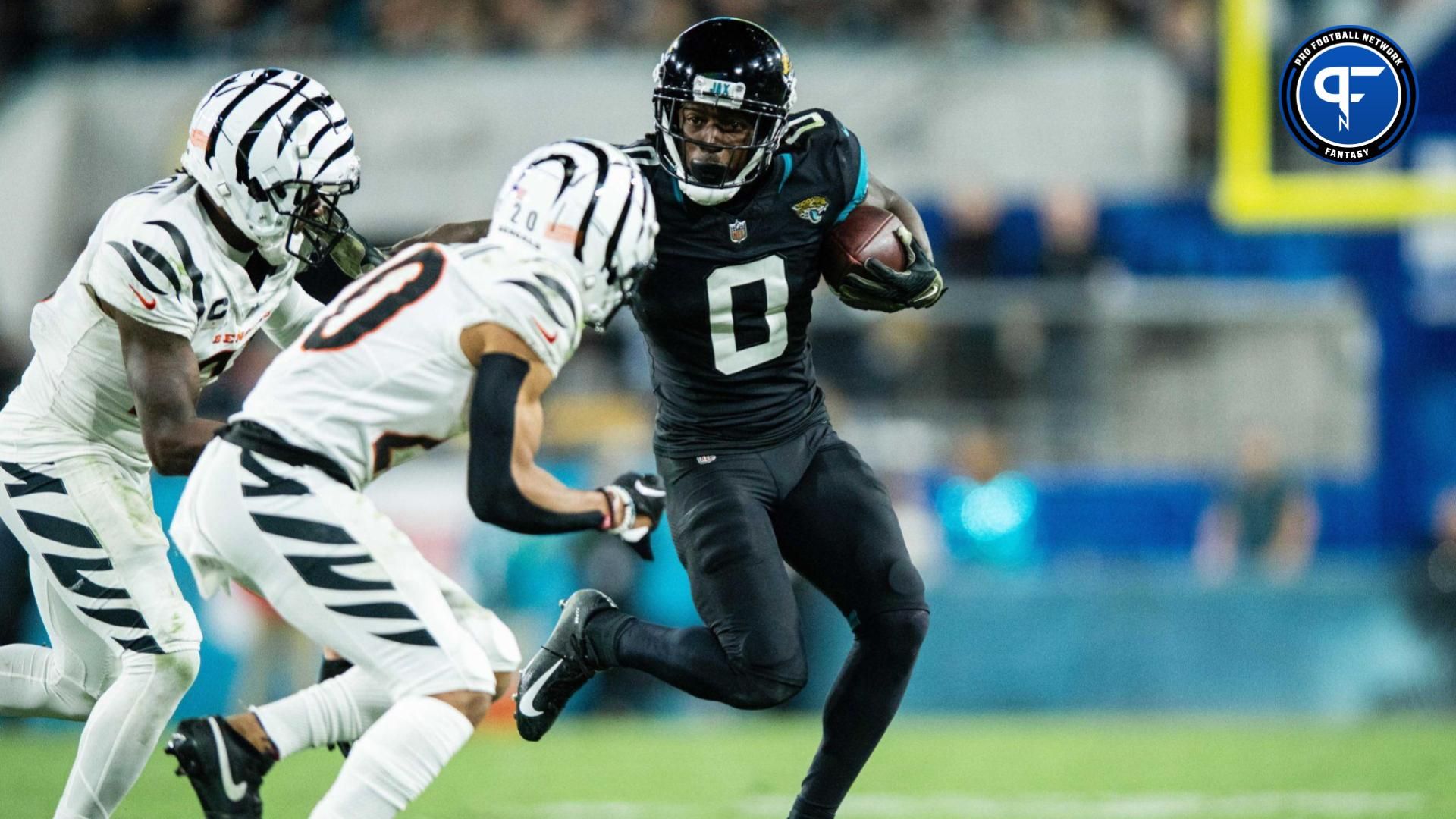 Jacksonville Jaguars wide receiver Calvin Ridley (0) runs the ball after the catch against the Cincinnati Bengals in the fourth quarter at EverBank Stadium.