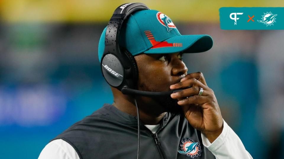 Miami Dolphins head coach Brian Flores watches from the sideline during the second quarter of the game against the New England Patriots at Hard Rock Stadium.