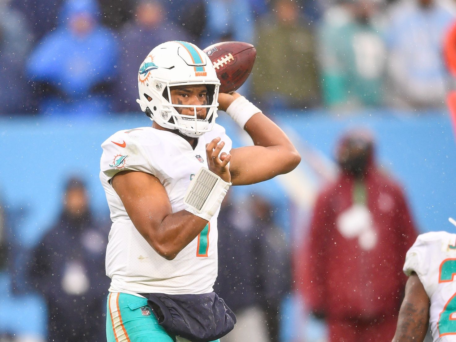 Miami Dolphins quarterback Tua Tagovailoa (1) throws against the Tennessee Titans during the second half at Nissan Stadium.