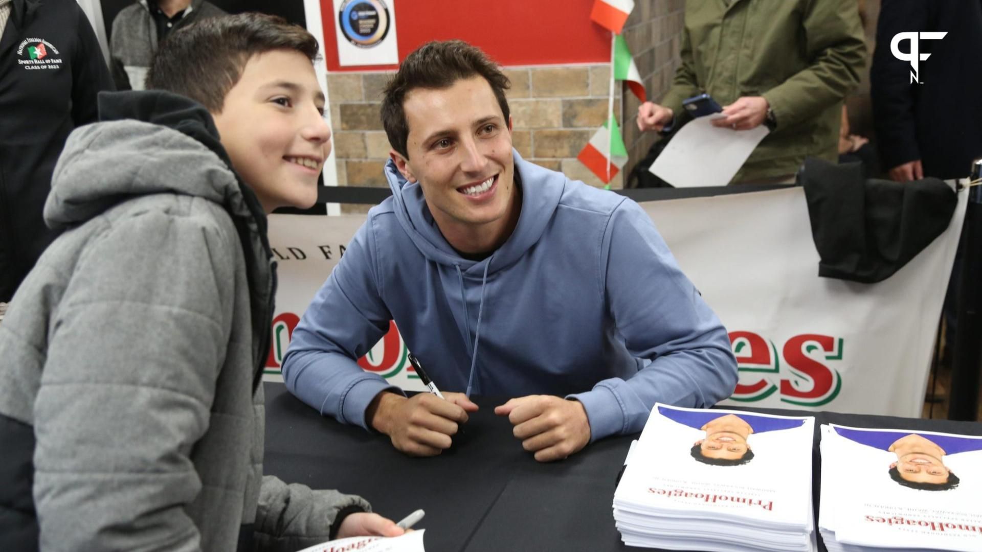 Fans lined up to see New York Giants quarterback and Don Bosco Prep alum, Tommy DeVito sign autographs.