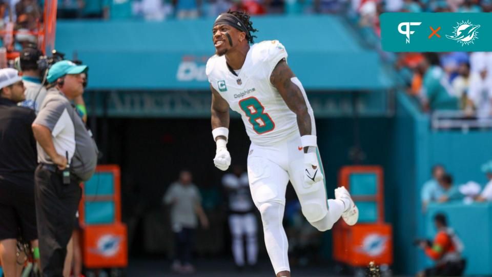 Miami Dolphins safety Jevon Holland (8) is introduced onto the field before a game against the Denver Broncos at Hard Rock Stadium.