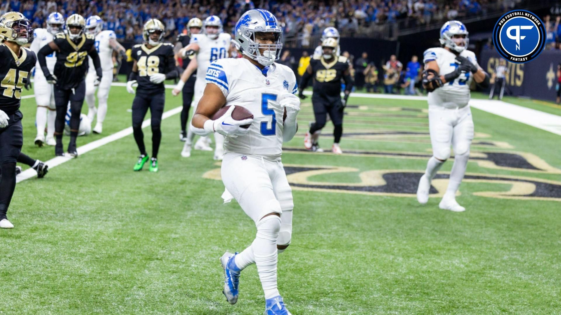 Detroit Lions running back David Montgomery (5) runs in for a touchdown against New Orleans Saints linebacker Nephi Sewell (45) during the first half at Caesars Superdome.