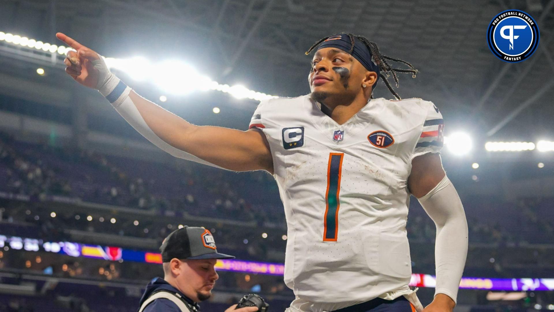 Chicago Bears quarterback Justin Fields (1) leaves the field after the game against the Minnesota Vikings at U.S. Bank Stadium.