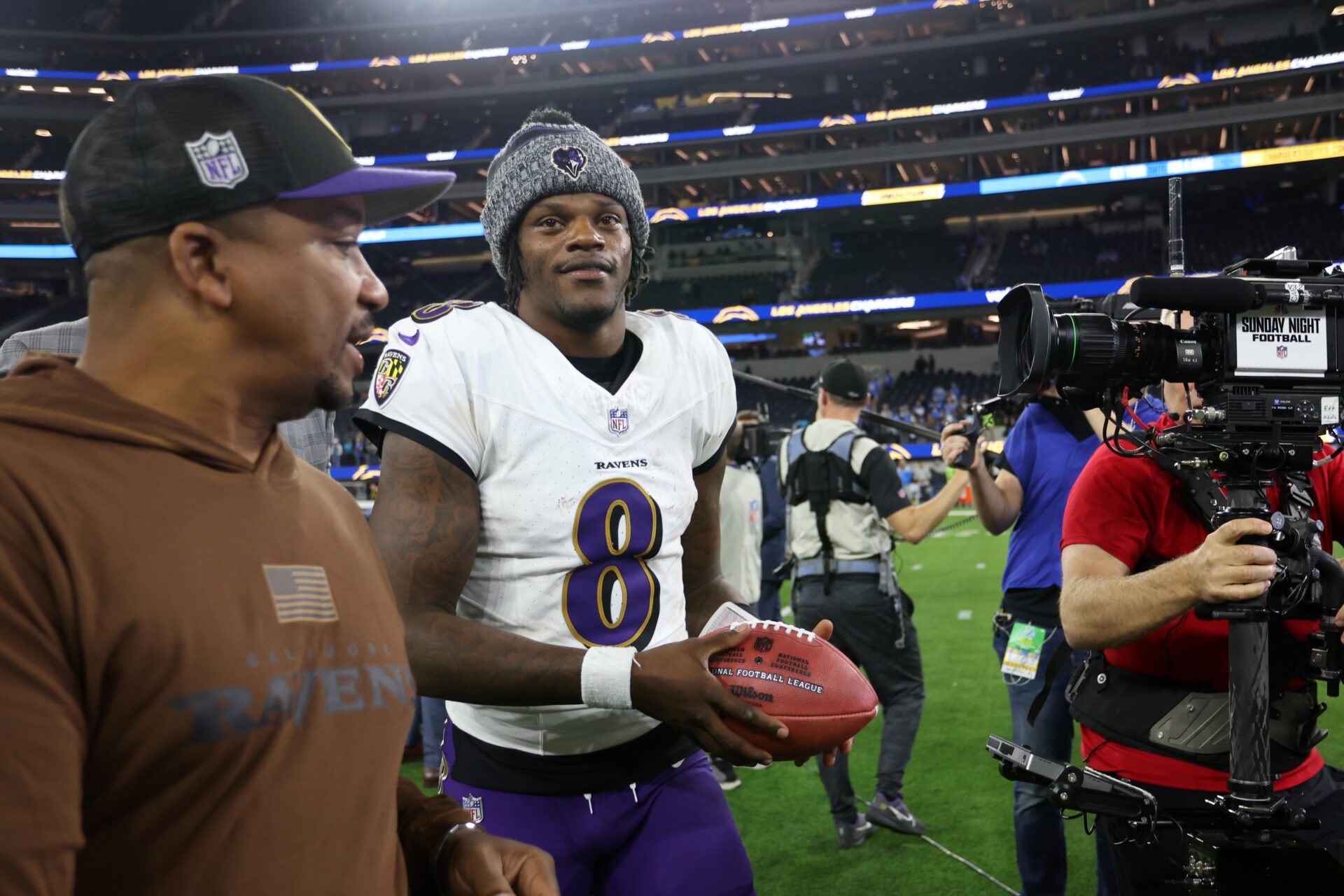 Baltimore Ravens quarterback Lamar Jackson (8) celebrates a victory after defeating the Los Angeles Chargers 20-10 at SoFi Stadium.