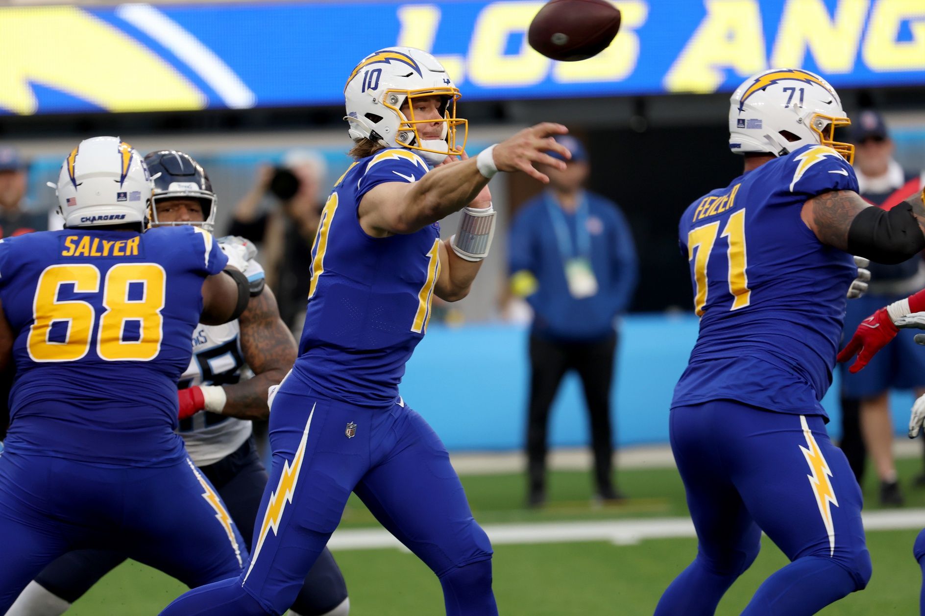 Los Angeles Chargers quarterback Justin Herbert (10) throws a pass during the second quarter against the Tennessee Titans at SoFi Stadium.