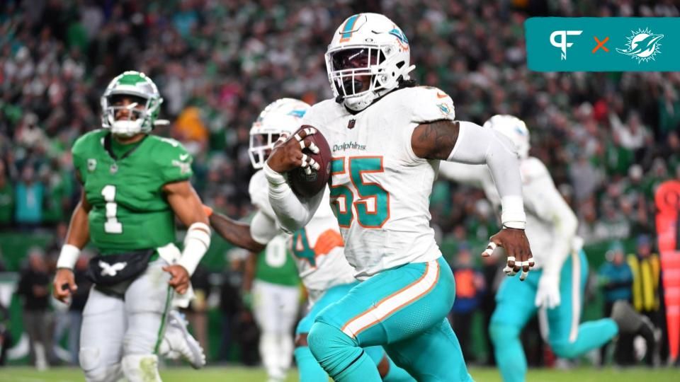 Miami Dolphins linebacker Jerome Baker (55) returns an interception for a touchdown during the third quarter against the Philadelphia Eagles at Lincoln Financial Field.