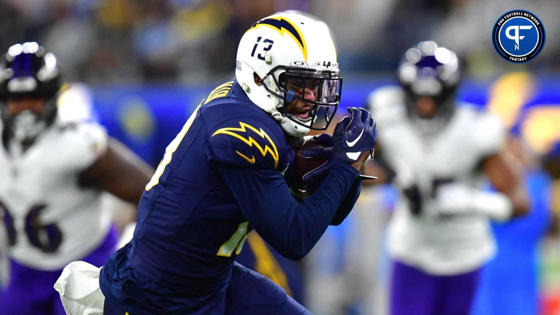 Los Angeles Chargers wide receiver Keenan Allen (13) runs the ball against the against the Baltimore Ravens during the first half at SoFi Stadium.