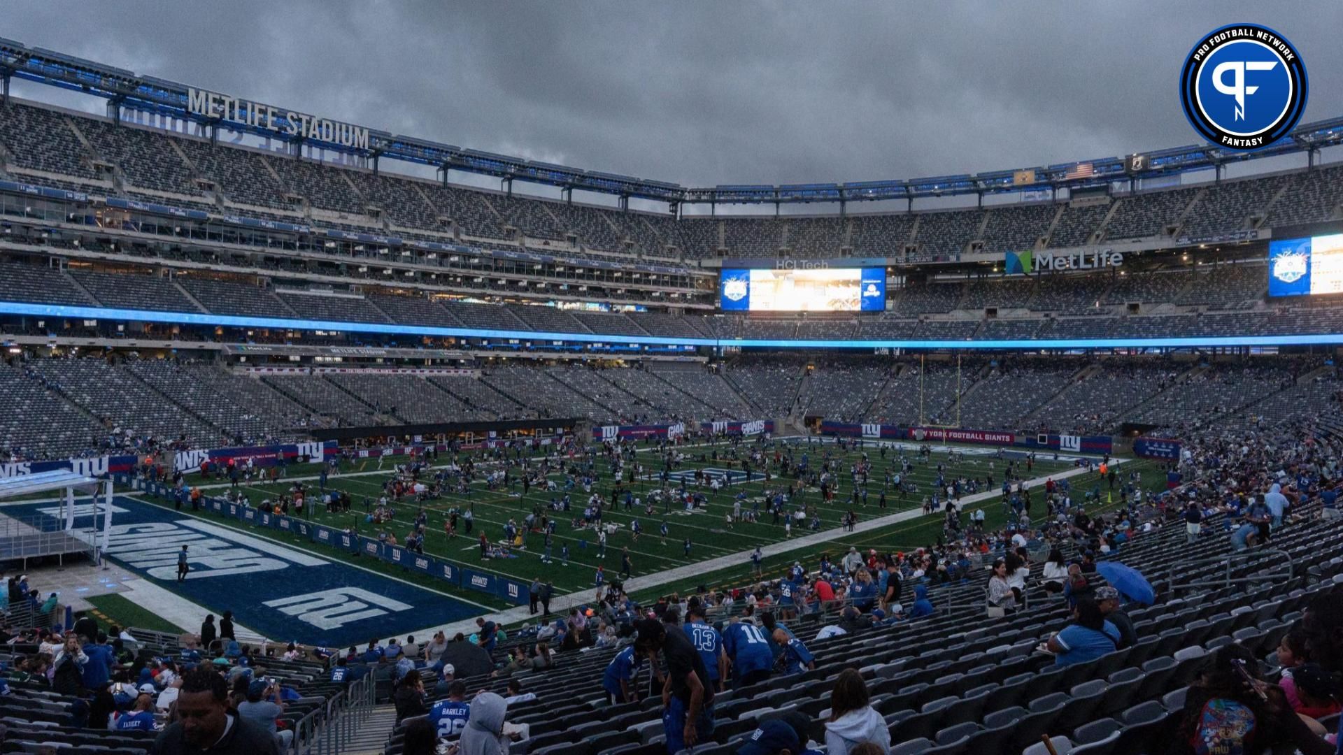 Rain clouds cover the sky during New York Giants Fan Fest at MetLife stadium in East Rutherford on Thursday, August 24, 2023