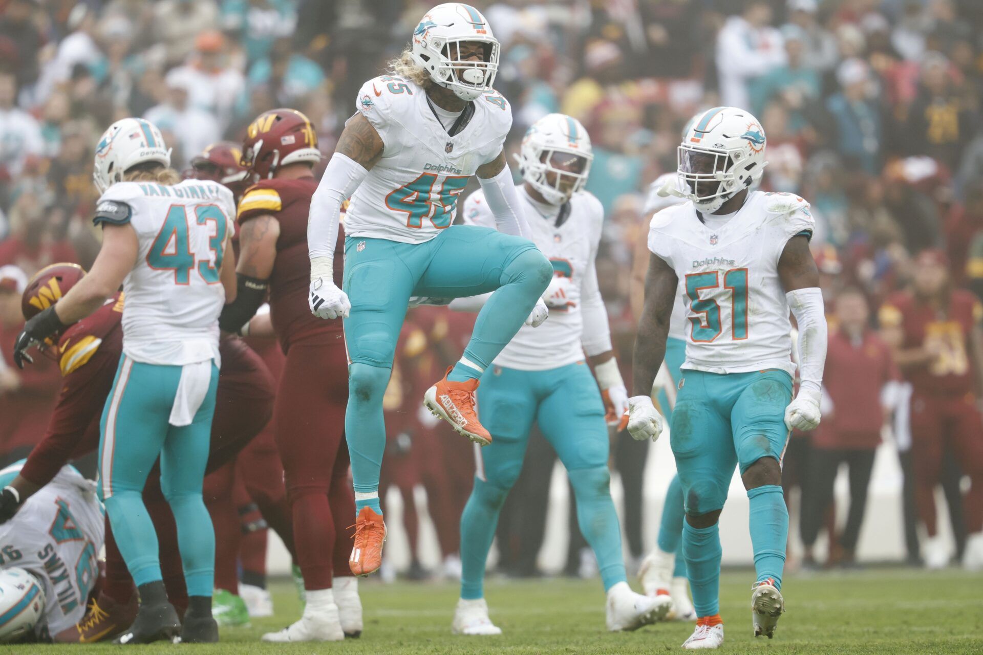 Miami Dolphins LB Duke Riley (45) celebrates after a sack against the Washington Commanders.