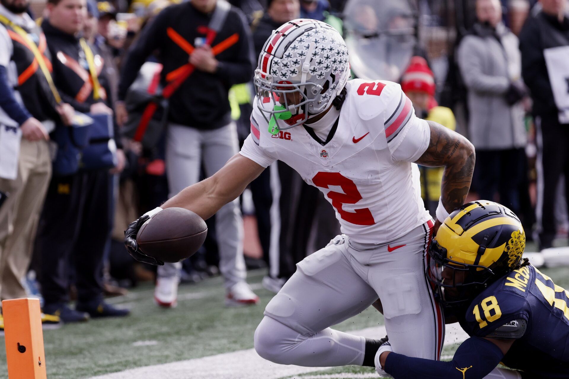 Ohio State Buckeyes WR Emeka Egbuka (2) reaches for the goal line against the Michigan Wolverines.